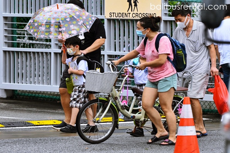 Singapore warns new virus strains infecting more children shuts schools