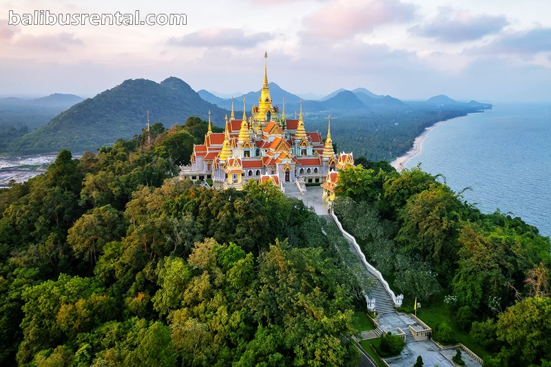 In Thailand, temples float on the water and in the clouds.